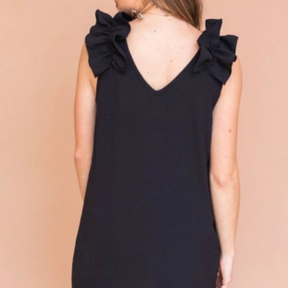 Classic Black Dress with a Twist
